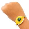 Showy Yellow Flower Sandalwood Rakhi